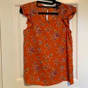 Floral top with flutter sleeves
